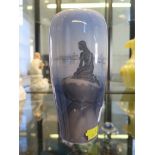 A Royal Copenhagen vase, depicting the Little Mermaid statue, marked 4463 Langelinie, 16.5 cm high