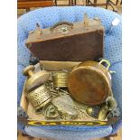 Various brasswares, including saucepan and lid, candleholders and trivets, and a suitcase