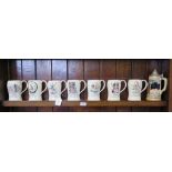 A set of seven Crown Devon tankards, each depicting a day of the week, 14 cm high, and a German