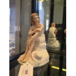 Regal porcelain figure study of Rachel - a young girl seated on a rock in a summer dress, number