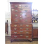 A George III mahogany chest on chest, the dentil cornice over two short and three long drawers