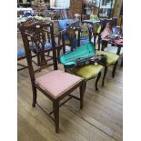 A pair of Edwardian stained wood and ivorine inlaid salon chairs, the carved backs inlaid with