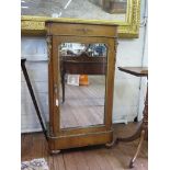 A Victorian line inlaid burr walnut pier cabinet, with gilt metal mounts and mirrored door enclosing