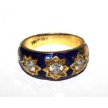 A three stone diamond and enamel ring in 18 carat gold, some damage to the enamel