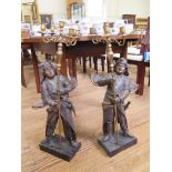 A pair of patinated bronze figures of Japanese Samurai holding five light staffs, 80 cm high