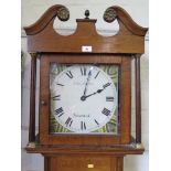 An early 19th century oak longcase clock, the swan-neck pediment over a square painted dial