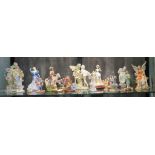 A collection of figures, resin and ceramic, mostly depicting fairies, a Royal Doulton figure of '