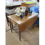 An early 19th century mahogany Pembroke table, with ebony stringing, frieze drawer and turned