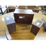 An early 19th century line inlaid tea caddy, of rectangular form with two compartments and gilt