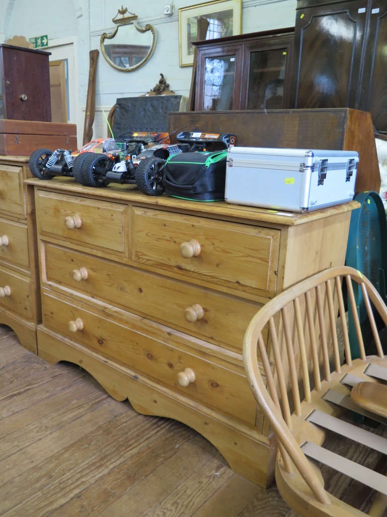 A pine chest of drawers, with two short and two long drawers on bracket feet, 112 cm wide, 75 cm