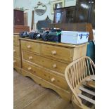 A pine chest of drawers, with two short and two long drawers on bracket feet, 112 cm wide, 75 cm