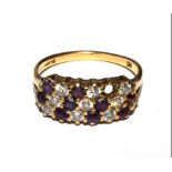 An 18 carat gold ring set with diamonds and amethysts, as found