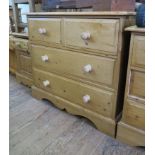 A pine chest of drawers, with two short and two long drawers on bracket feet, 92 cm wide, 83 cm high