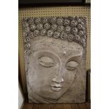 A resin panel depicting the face of Buddha, 100 x 70 cm