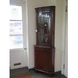 A reproduction crossbanded mahogany corner cabinet, 184 cm high