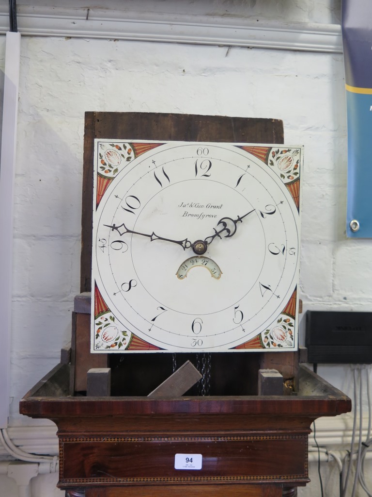 An early 19th century oak and mahogany crossbanded longcase clock, the painted square dial inscribed