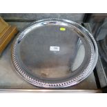 Six plated circular salvers, largest 35 cm diameter (6)