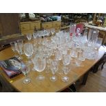 Various drinking glasses, vases and decanters, including Stuart Crystal, Royal Doulton Crystal,