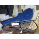 A National Style 'O' resonance guitar, 1930s, with patent numbers, cased, total length 97 cm