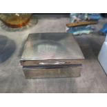 A square silver cigarette box, with engine turned lid, London 1963, 8.5 cm wide