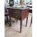 A George III mahogany side table, with two frieze drawers on square section legs, 61 cm wide, 45.5