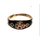 A 9 carat gold ring set with seed pearls (two missing) in black enamel, as found