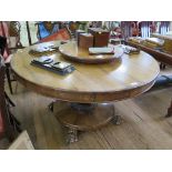 A George IV rosewood breakfast table, the circular snap top on an octagonal baluster stem and