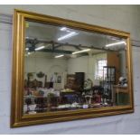 A giltwood rectangular mirror, with bevelled plate, 68 x 98 cm