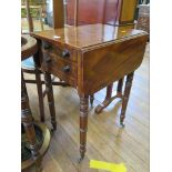 A Regency crossbanded mahogany Pembroke table, the hinged top over two frieze drawers on ring turned