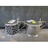 A large Victorian silver mustard pot, the octagonal lid engraved with a crest within a cartouche,