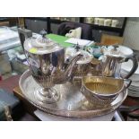 A six piece silver plated tea and coffee set to include tray, tea pot, coffee pot, water jug, etc