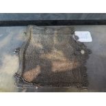 A Victorian silver mesh ladies hand bag with silver plated mounts (some damage to mesh)