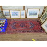 A Kazak rug, the blue pole medallion on a red field with ivory spandrels within a geometric leaf