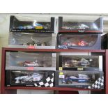 Eight 1:18 Scale racing cars by Minichamps, Hotwheels and Onyx, in original window boxes (8)