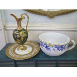 A pottery chamber pot with gilt and lattice decoration and blue painted border, with impressed