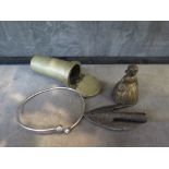 An oriental brass hinged pot, a bracelet, a table bell and an old arrow head