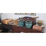 Various garden accessories including a terracotta window-sill planter 24cm, two green glazed and one