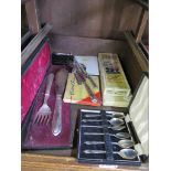 A collection of cocktail items, a cased set of fish servers and a cased set of cake slice and