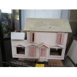 A home-made dolls house, 80cm long and a selection of miniature furniture