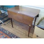 A late George III crossbanded and chequer banded mahogany Pembroke table, the shaped top and