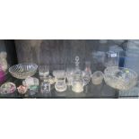 A large collection of glass ware, including etched goblets, shot glasses, tumblers, paperweights,