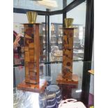 A pair of Hayadith Jerusalem-ware inlaid olive wood candle holders with brass sconces, both with