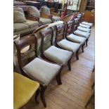 A set of eight Regency mahogany dining chairs, the tablet top rails and rope twist mid rails over
