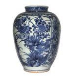 A 17th century Oriental vase, of Japanese design, the inverted rim over three Arita style floral