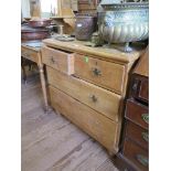 A Victorian pine chest of drawers, with two short and two long graduated drawers, with brass handles