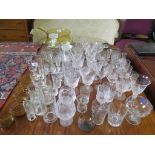 An amber glass punch bowl and glasses, 22cm diameter, and various other drinking glasses