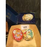 A Halcyon Days enamel 1984 Easter egg pill box, in box, and two others, 'A Year To Remember' and