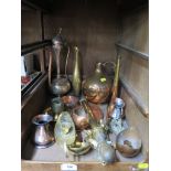 Various brass and copperwares, including a bulbous jug, a hunting horn, and measuring jugs