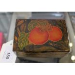 A rectangular papier mache box, with fruit design lid, 9.3cm wide