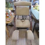 A bentwood orthopaedic rocking chair, with beige upholstery